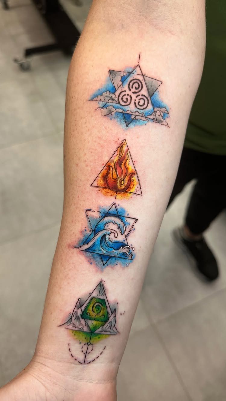 Four Elements Tattoo Design: 7 Styles That Hold Their Own 7 Four elemental tattoos with geometric shapes and colorful designs on a person's forearm.