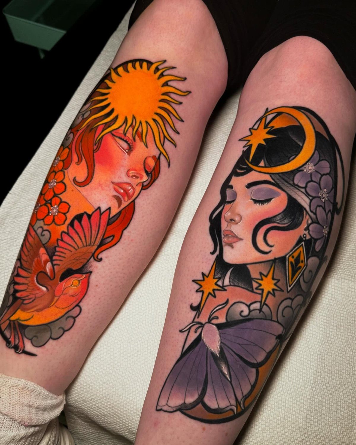 Two colorful neo-traditional tattoos of sun and moon goddesses on a person's legs.